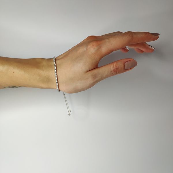Срібний браслет з фіанітами, вага виробу 3,9 гр (2128892) adjustable розмір 2128892 фото