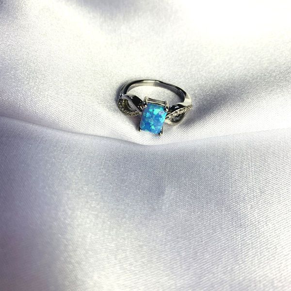 Срібна каблучка з опалом 0.951ct, вага виробу 2,93 гр (2060789) 17.5 розмір 2060789 фото