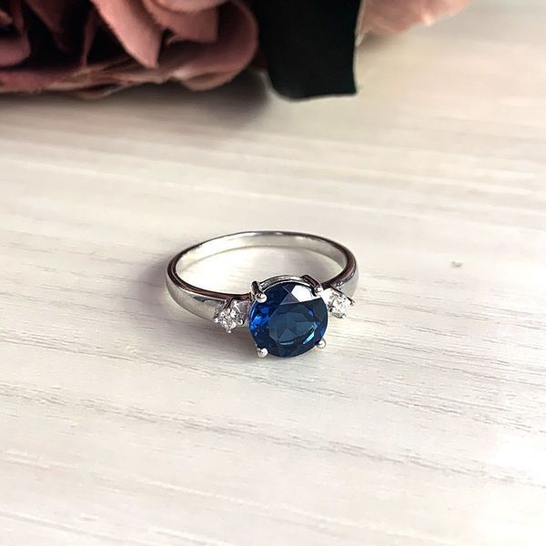 Срібна каблучка з топазом Лондон Блю 1.642ct, вага виробу 2,62 гр (2024644) 17 розмір 2024644 фото