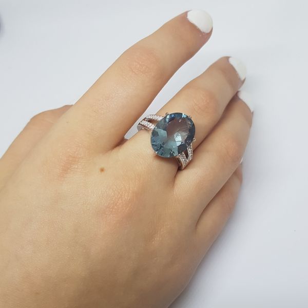 Срібна каблучка з натуральним флюоритом 10.18ct, топазом білим, вага виробу 5,97 гр (2121626) 19 розмір 2121626 фото