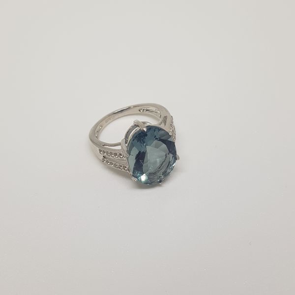 Срібна каблучка з натуральним флюоритом 10.18ct, топазом білим, вага виробу 5,97 гр (2121626) 19 розмір 2121626 фото